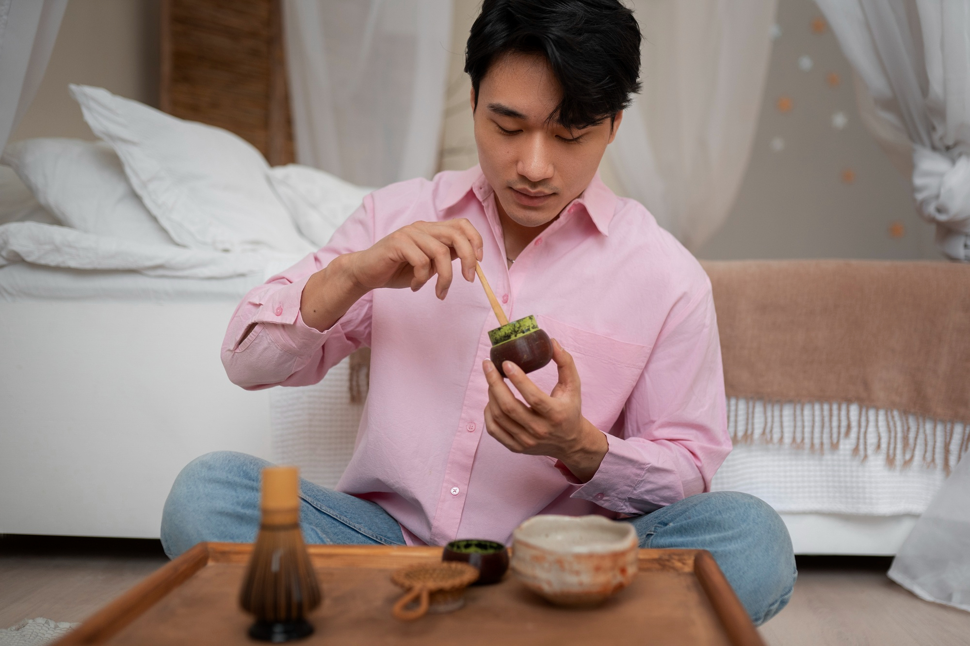 Man drinking herbal tea during a natural detox cleanse